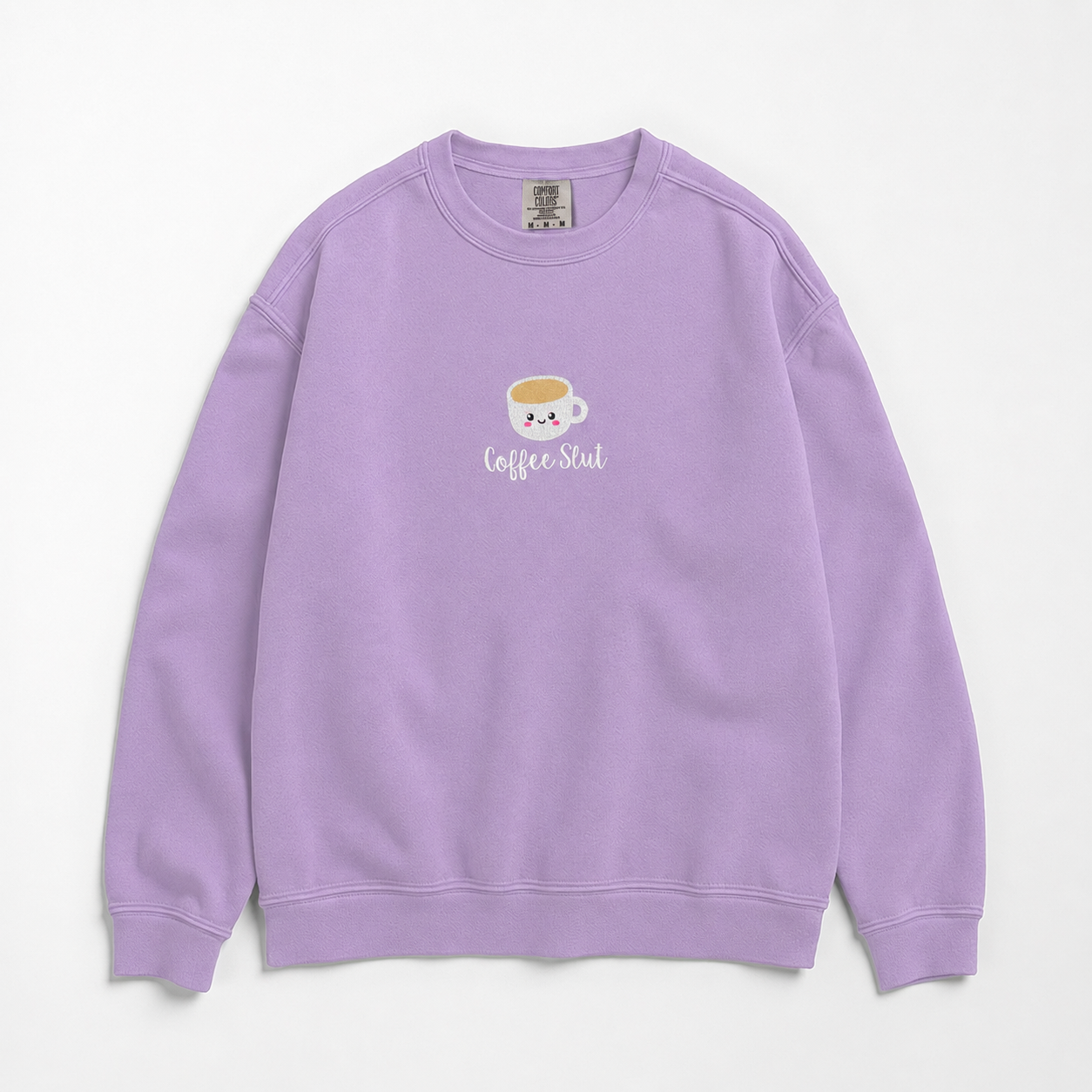 A light purple crewneck sweatshirt featuring a small embroidered coffee cup with the text 'Coffee Slut' on the chest, displayed against a clean white background.