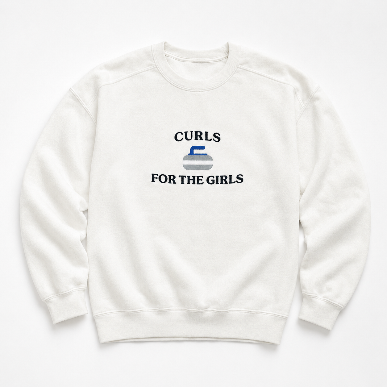 An off-white crewneck sweatshirt featuring a graphic embroidered on the chest that reads 'CURLS FOR THE GIRLS' with a curling stone illustration, displayed flat against a clean white background.
