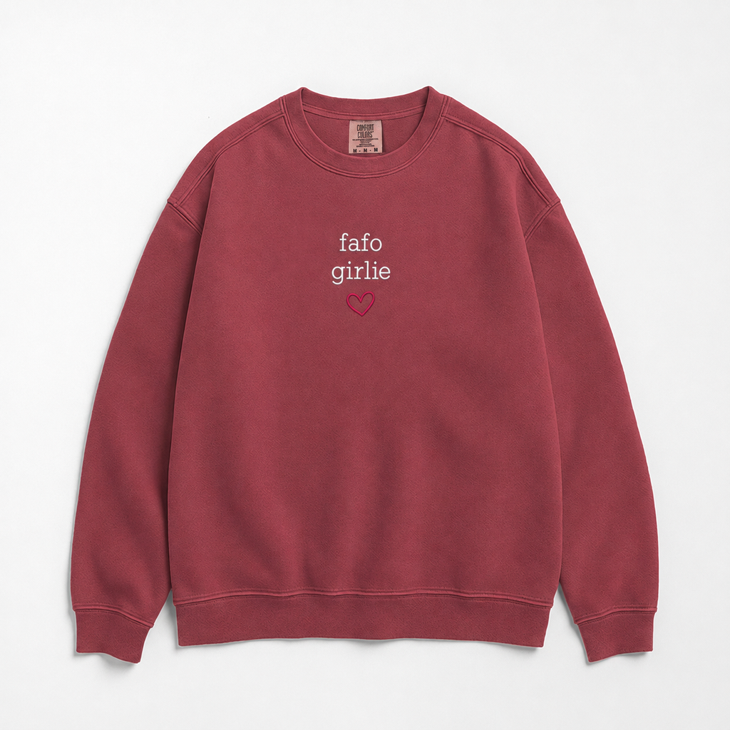 A dusty rose crewneck sweatshirt with 'fafo girlie' and a small heart embroidered on the chest, displayed flat against a light gray background.