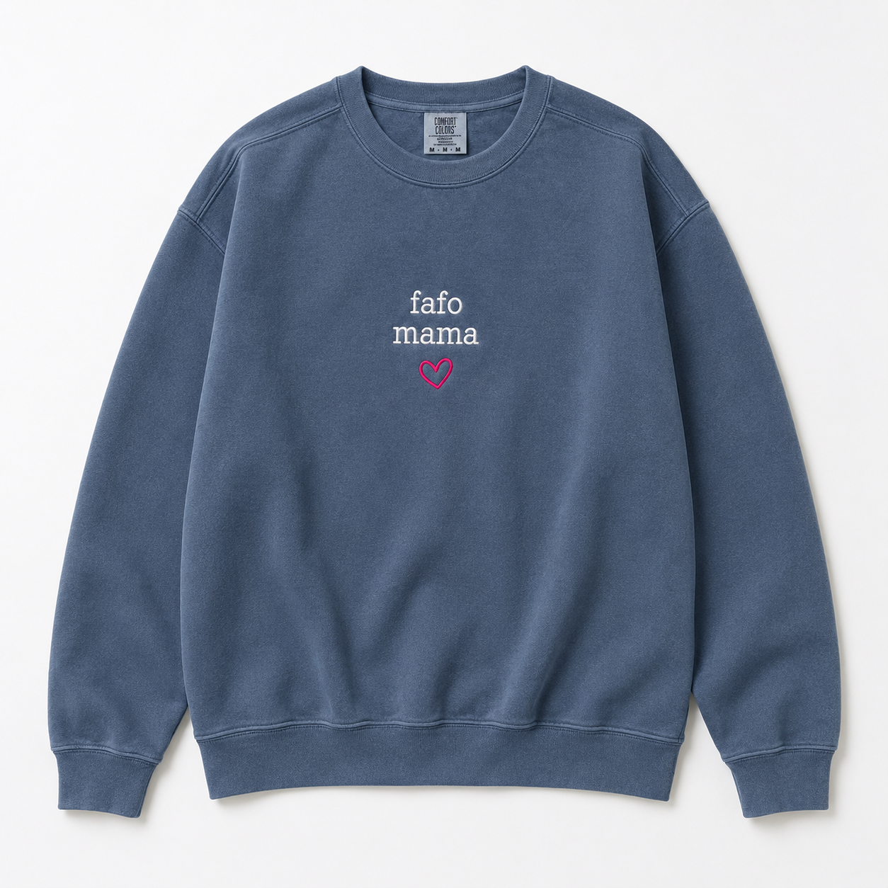 A slate blue crewneck sweatshirt with 'fafo mama' embroidered in white on the chest and a small pink heart graphic below it, displayed flat against a light off-white background.