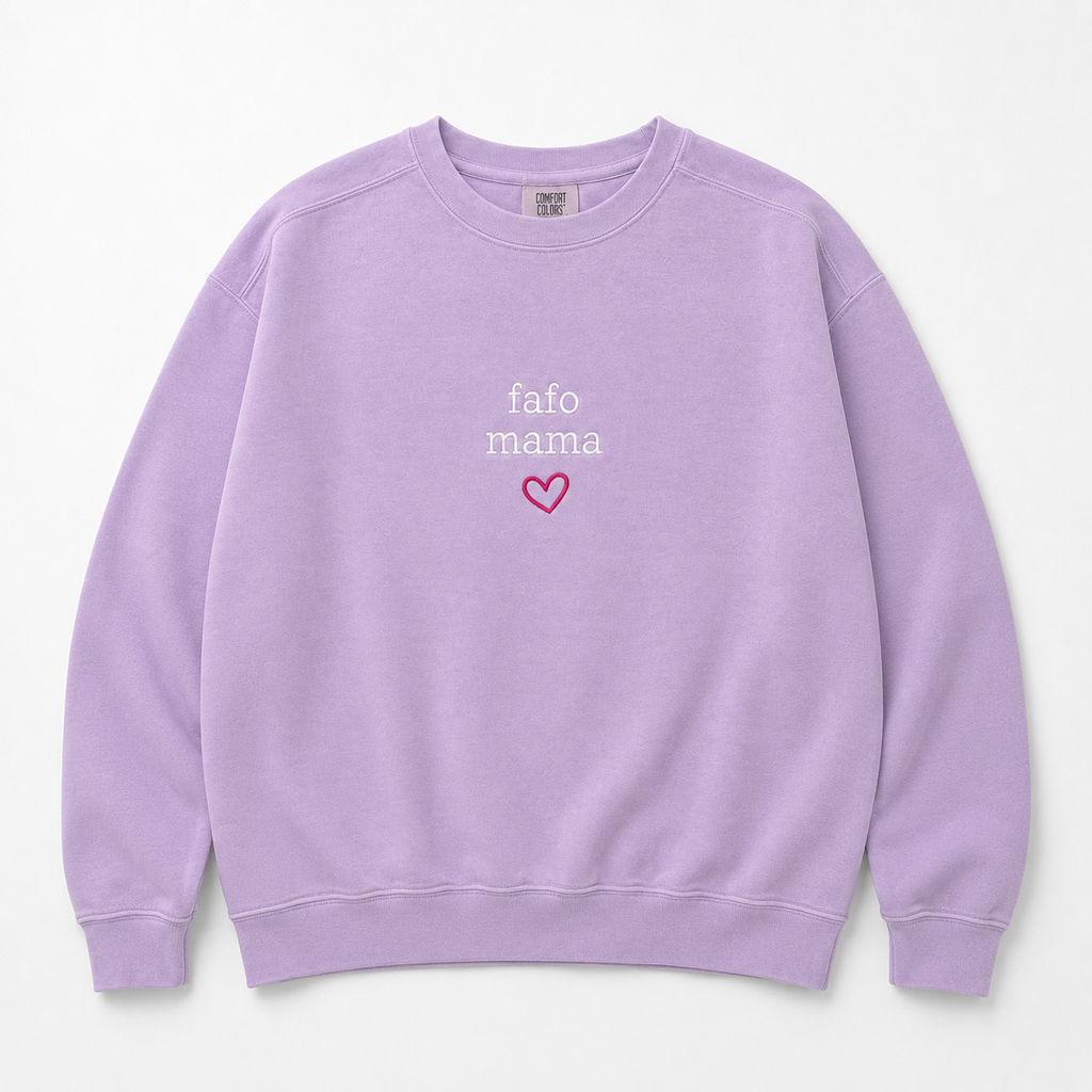 A light purple crewneck sweatshirt with 'fafo mama' embroidered in white text and a small pink heart outline on the chest, displayed flat against a light gray background.