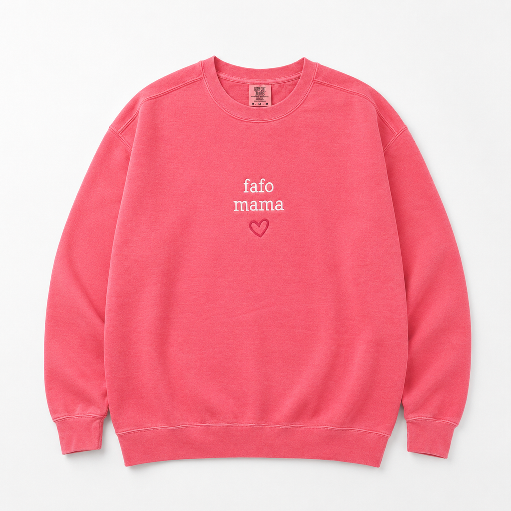 A pink crewneck sweatshirt with 'fafo mama' and a small heart embroidered on the chest, displayed flat against a light gray background.