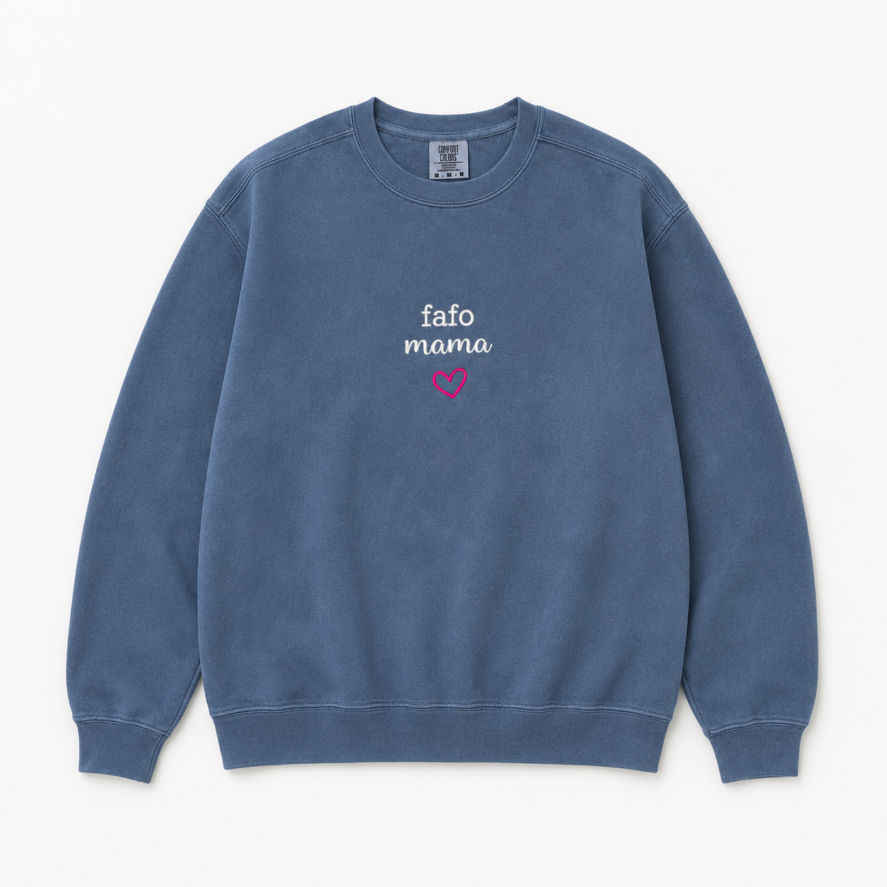 A washed blue crewneck sweatshirt featuring embroidered text 'fafo mama' in white and a small pink heart on the chest, displayed flat against a light off-white background.